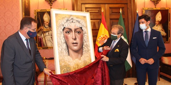 El Ayuntamiento acoge la presentación del cartel conmemorativo del 50 aniversario de la imposición de la Medalla de Oro de la Ciudad de Sevilla a la Virgen de la Esperanza Macarena