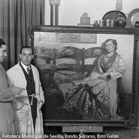 15.-  El pintor sevillano José Fernández Venegas posa en su estudio ante el retrato de su sobrina Isabel  con el periodista Manuel Vives, redactor del diario sevillano La Unión durante una entrevista para la sección Pintores Ilustres. 1933. ©ICAS-SAHP, Fototeca Municipal de Sevilla, fondo Serrano, foto Gelán