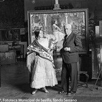4.- Gonzalo Bilbao posa en su estudio junto a Reyes, su modelo para cuadros de escenas costumbristas. 1932. ©ICAS-SAHP, Fototeca Municipal de Sevilla, fondo Serrano